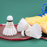 three badminton shuttlecock with racket and shoes 2021 08 30 18 49 43 utc