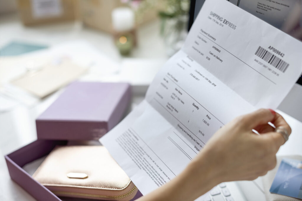 woman holding bill payment 2022 12 15 23 37 24 utc