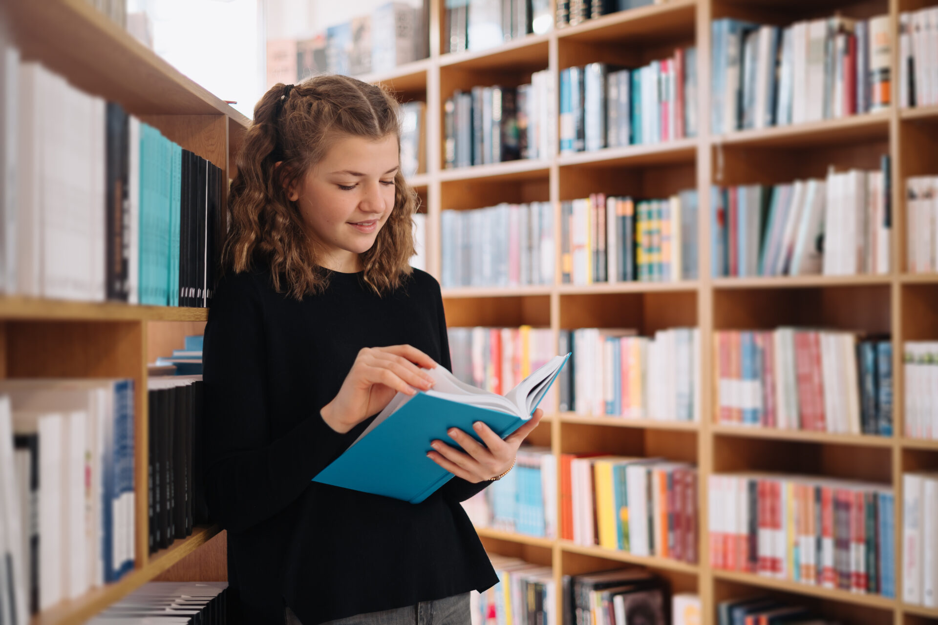 beautiful girl is studying reading a book while st 2021 09 15 18 55 29 utc