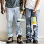 couple painting house wall 2022 12 16 01 26 23 utc