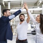 happy businessman and employees high fiving in a f 2022 12 16 22 12 26 utc