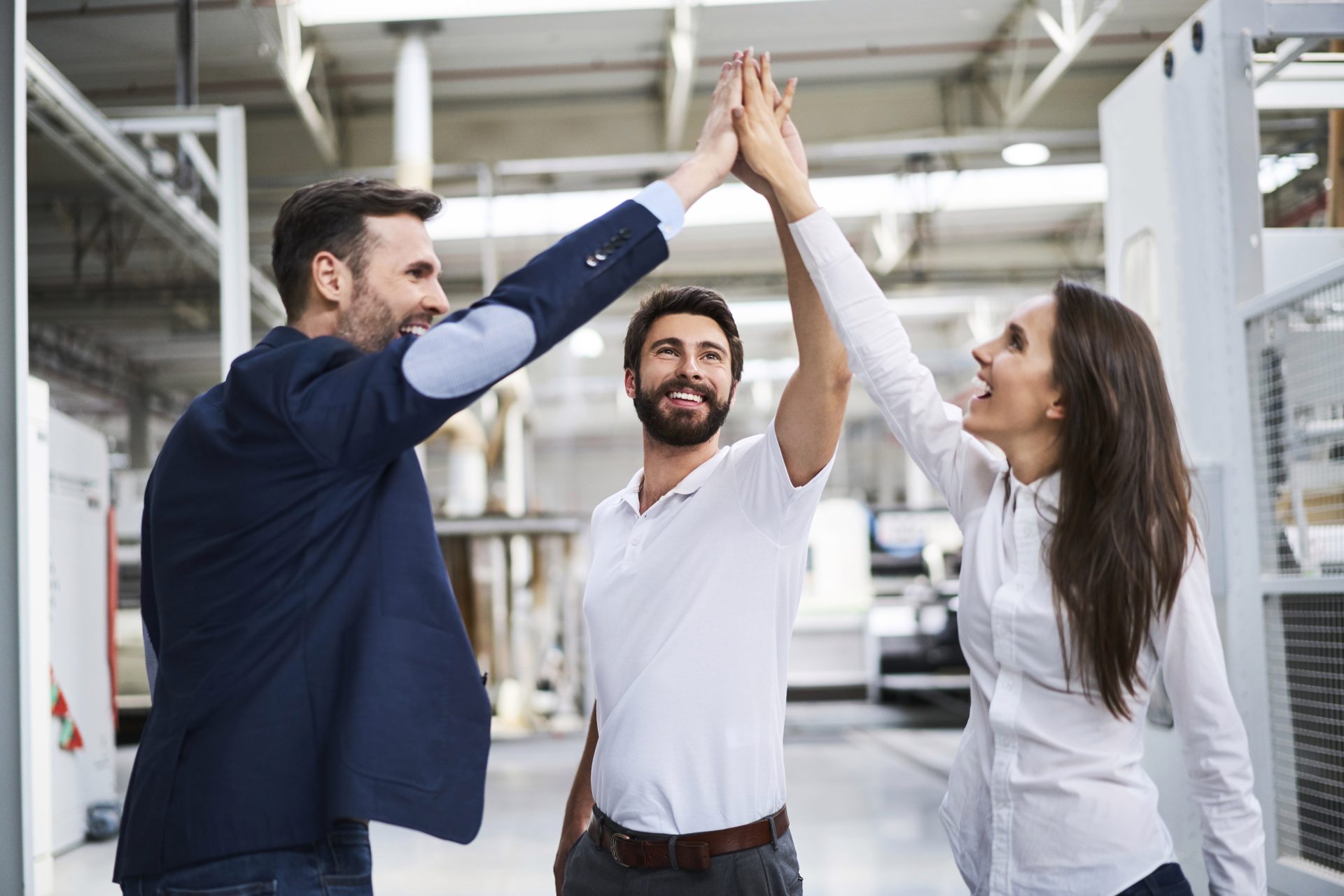 happy businessman and employees high fiving in a f 2022 12 16 22 12 26 utc