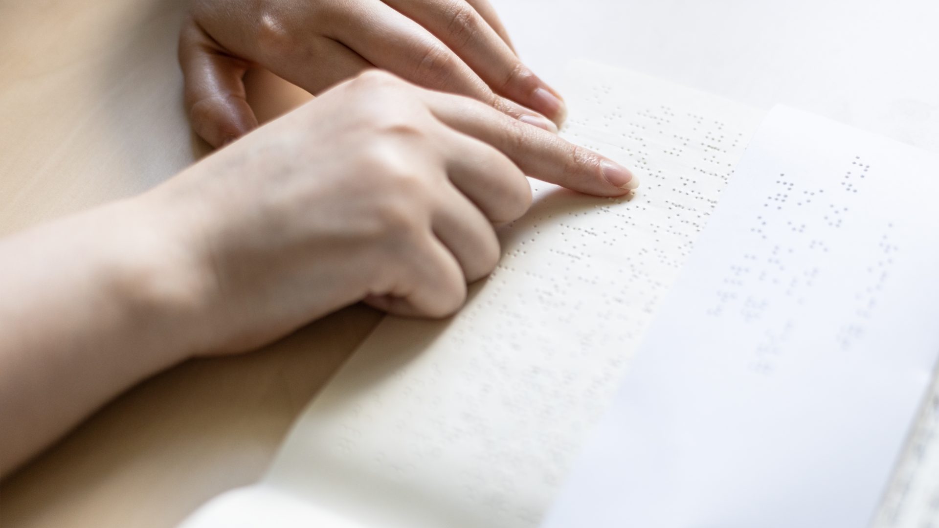 reading book and note with braille text 2021 12 09 07 33 21 utc