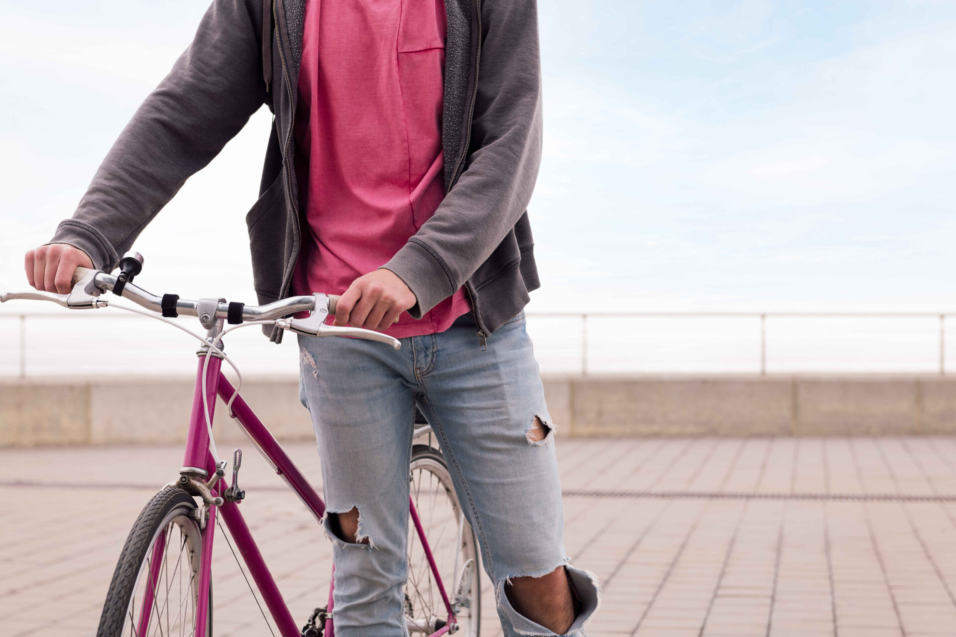 unrecognizable young man walking with vintage bike 2022 05 30 17 49 02 utc 2