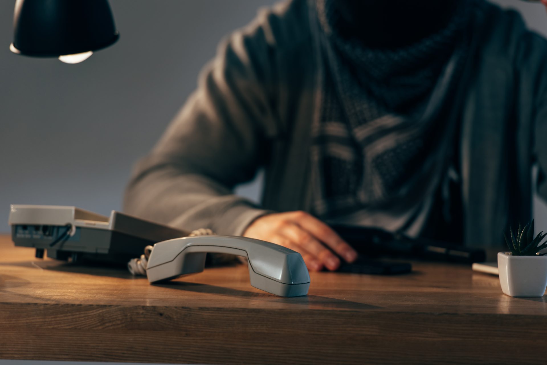 cropped view of terrorist sitting at table with te 2023 04 28 04 16 45 utc