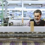 male factory worker on weaving machine in woollen 2022 03 08 00 13 56 utc