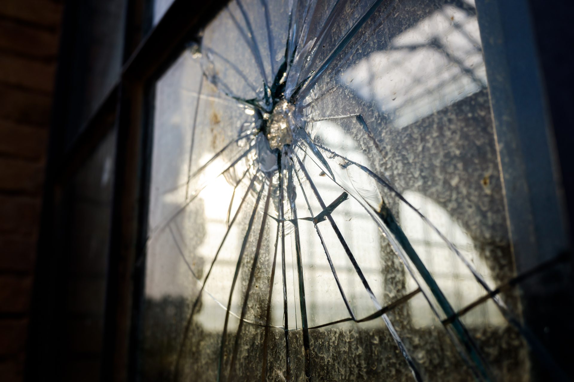 stoned window with broken glass of an industry 2022 05 03 12 11 58 utc