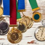 stopwatch and sport medals 2021 08 31 13 51 54 utc