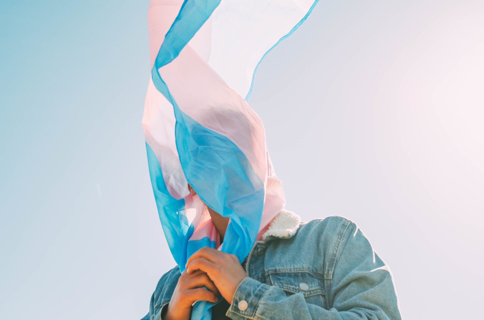 unrecognizable man covering his face with the tran 2023 02 28 19 41 38 utc