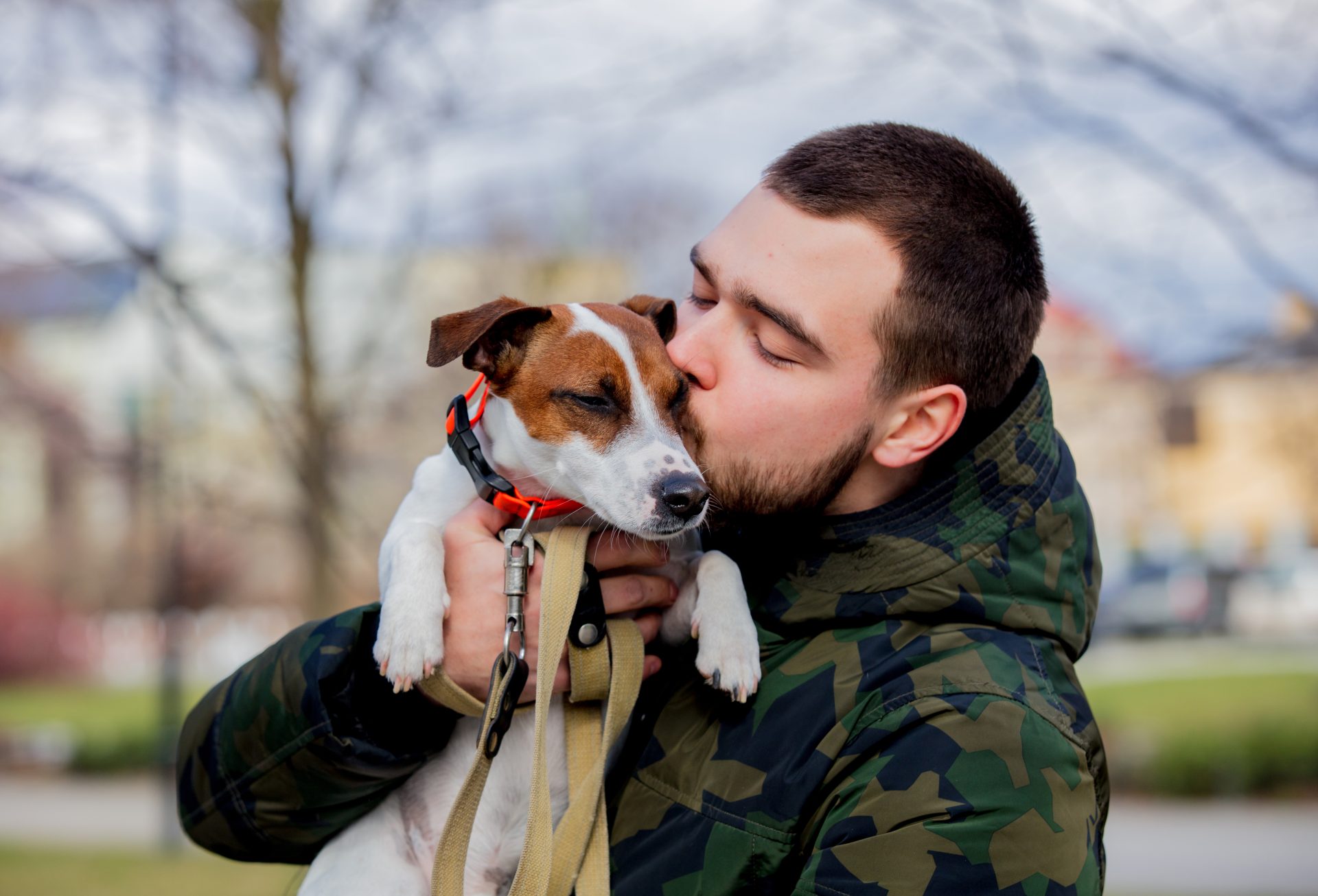young man with his dog jack russell terrier 2022 01 12 05 09 31 utc