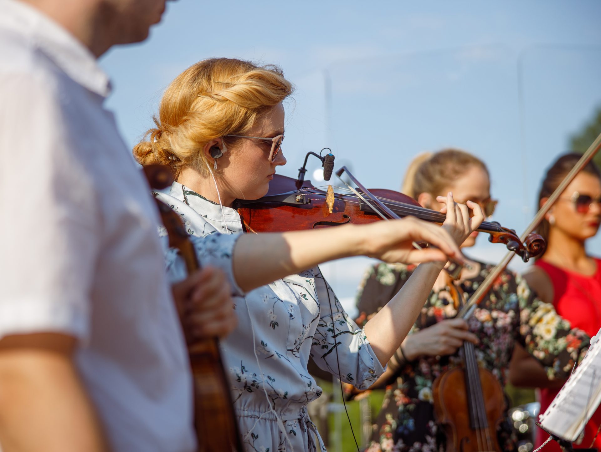 beautiful young woman playing violin in orchestra 2022 01 18 16 08 55 utc