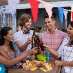 group of friends toasting beer bottles 2021 08 28 17 57 34 utc