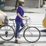 mid adult woman cyclist waiting on pedestrian cros 2022 03 04 01 54 11 utc