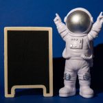 plastic toy astronaut with blackboard template moc 2023 05 10 15 25 39 utc 2