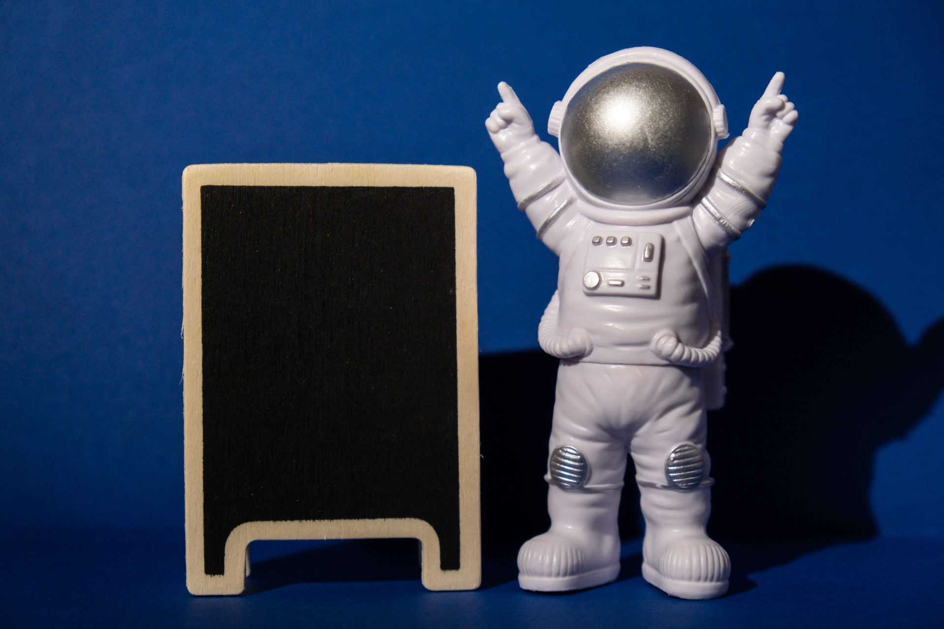 plastic toy astronaut with blackboard template moc 2023 05 10 15 25 39 utc 2