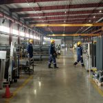 factory employees in hardhats walking in line 2021 09 24 03 44 11 utc