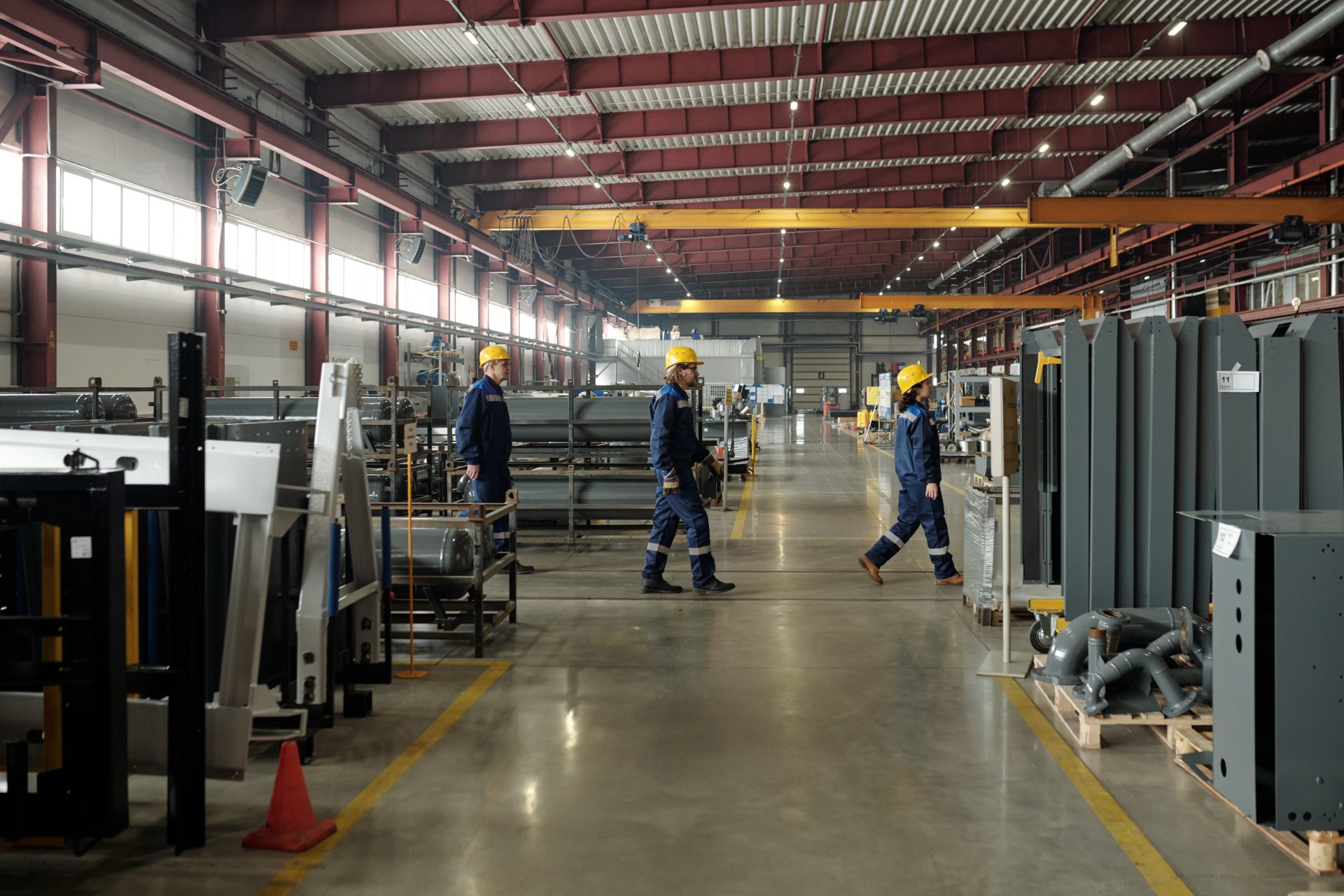 factory employees in hardhats walking in line 2021 09 24 03 44 11 utc