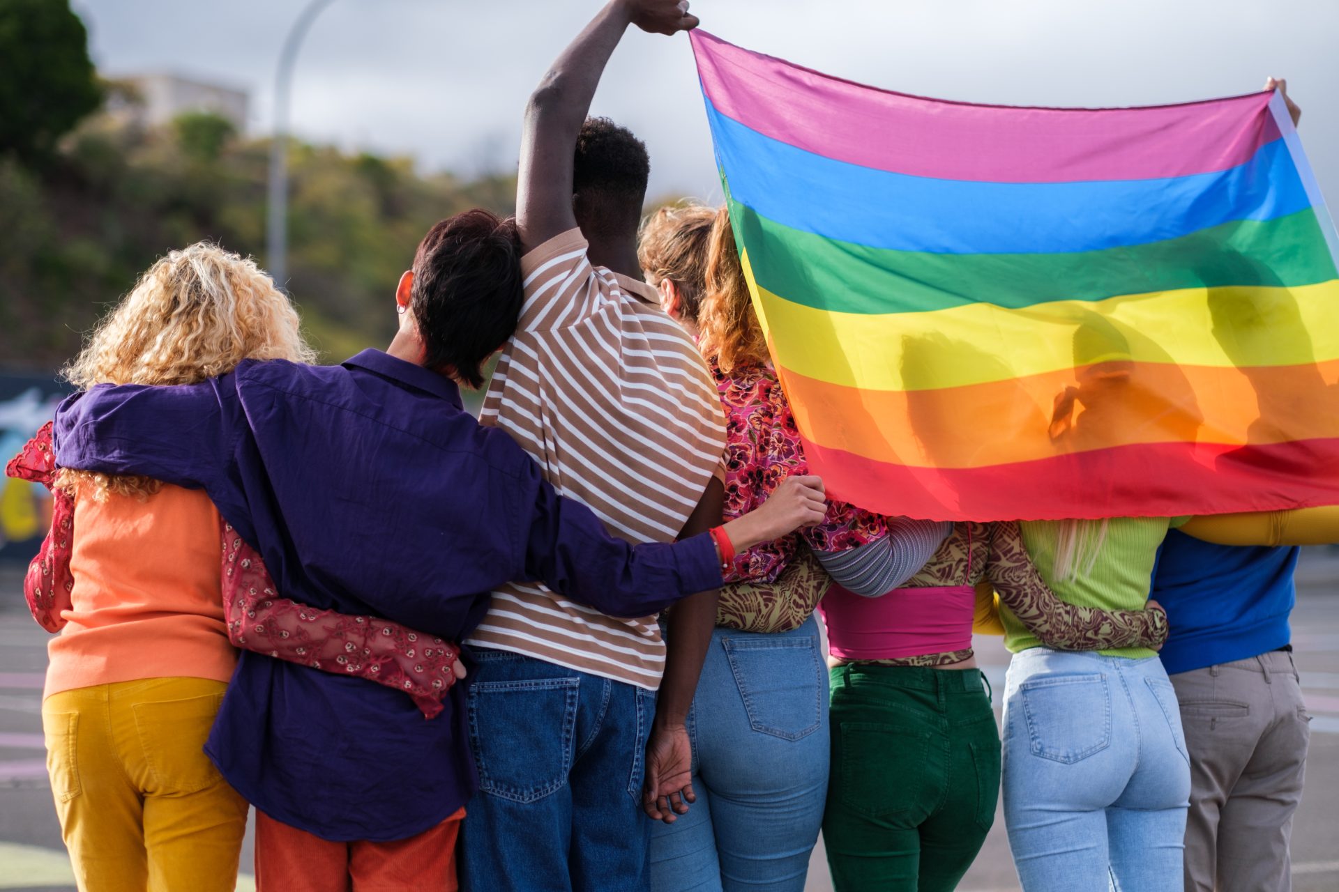group of young people from behind holding the lgbt 2023 05 04 18 32 21 utc
