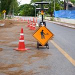 under construction sign on the asphalt road 2022 12 07 04 46 51 utc