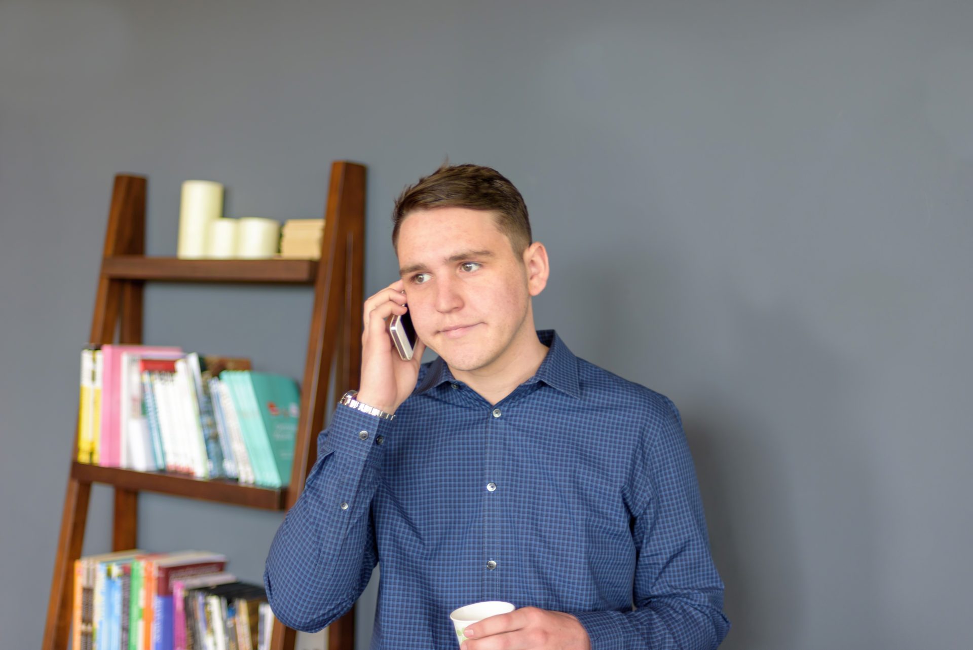 young man on cell phone 2022 11 07 05 46 07 utc
