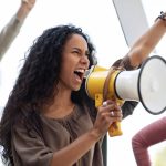 closeup of motivated woman leading group of strike 2022 12 16 07 06 41 utc