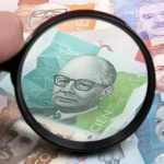 colombian peso in a magnifying glass 2021 08 29 13 39 28 utc