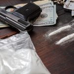 drugs smuggling and trafficking handcuffs pistol 2022 12 16 12 09 07 utc
