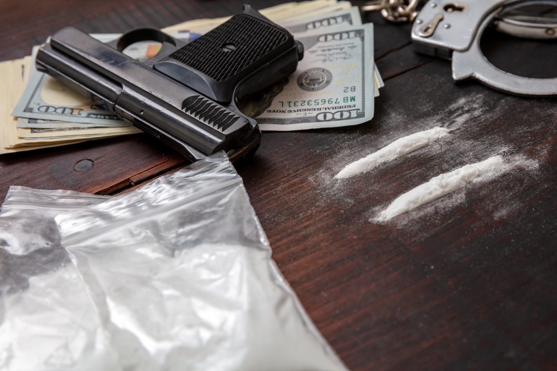 drugs smuggling and trafficking handcuffs pistol 2022 12 16 12 09 07 utc