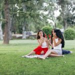friends in a park enjoying popsicles 2023 03 28 01 49 47 utc