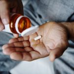 man taking medicine 2022 12 15 22 55 34 utc