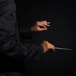 orchestra conductor hands musician director holdi 2022 12 16 03 22 55 utc