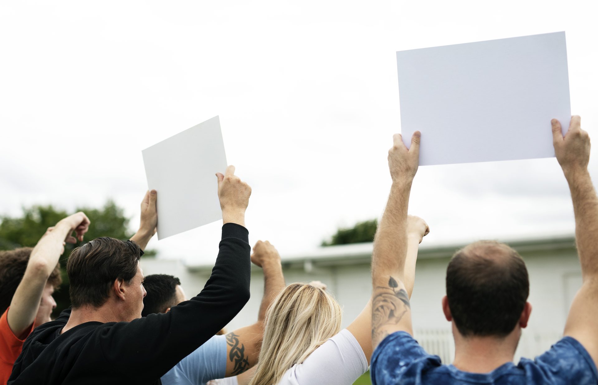 rear view of activists showing papers while protes 2022 12 16 01 13 52 utc