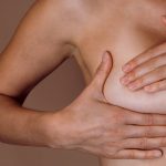 woman giving self breast exam 2022 11 15 18 03 19 utc