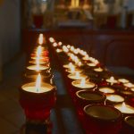 burning candles in the church 2022 11 16 17 58 11 utc