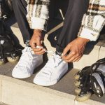 close up of man s feet preparing the inline skates 2023 03 17 18 16 35 utc