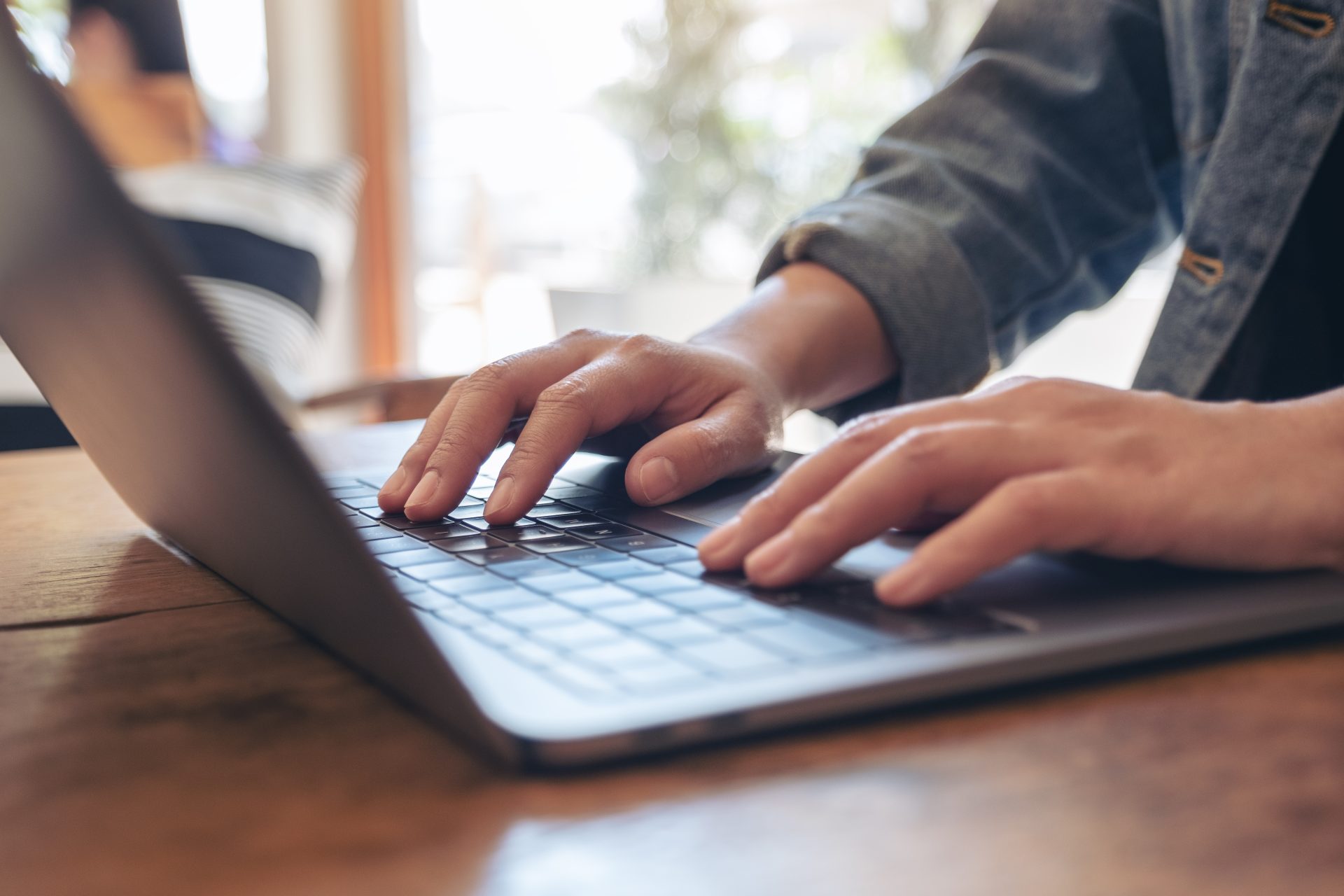 closeup image of woman s hands using and typing on 2022 12 16 05 35 35 utc