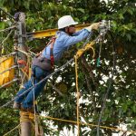 male electrician working at the height of a pole c 2022 08 18 19 23 07 utc