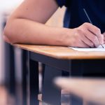 student writing final exam in classroom 2022 01 28 04 51 25 utc
