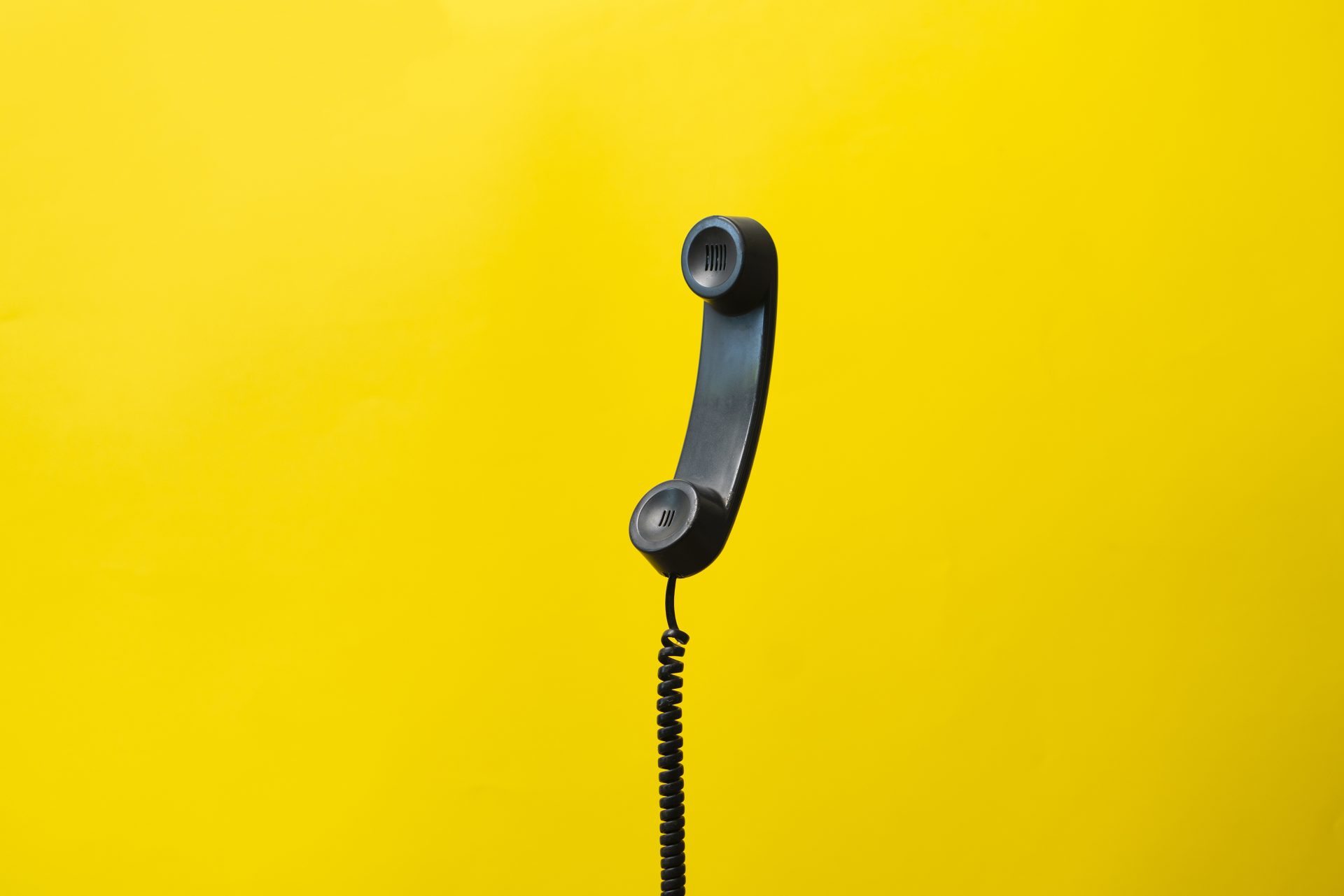 a simple dark old telephone handset with cable on 2023 11 27 05 19 19 utc