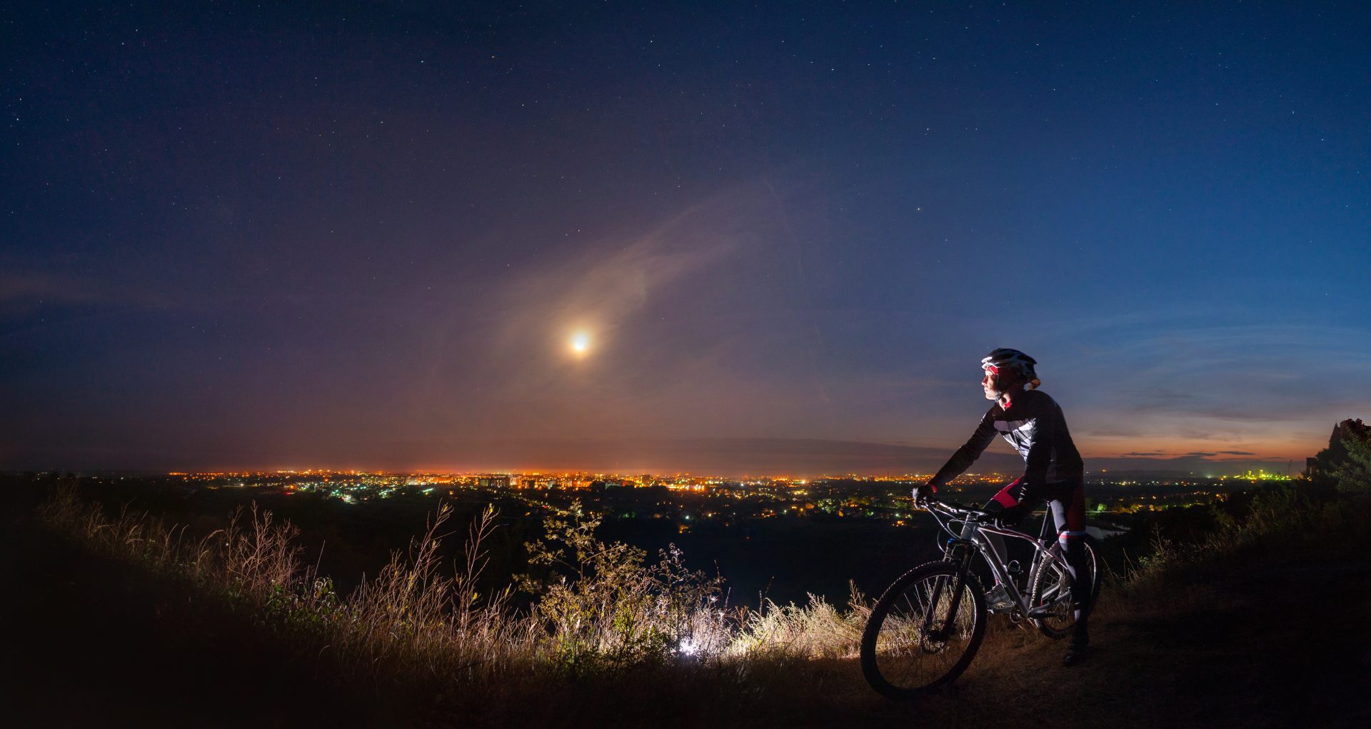 cyclist with mountain bike on top of the hill 2023 11 27 05 17 02 utc