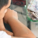 disappointed young man looking at his savings gla 2023 11 27 05 11 40 utc