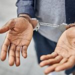 focused photo on male hands being in handcuffs 2023 11 27 05 07 30 utc