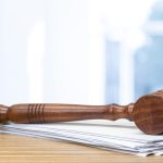 judge hammer on white paper and table 2023 11 27 05 13 10 utc