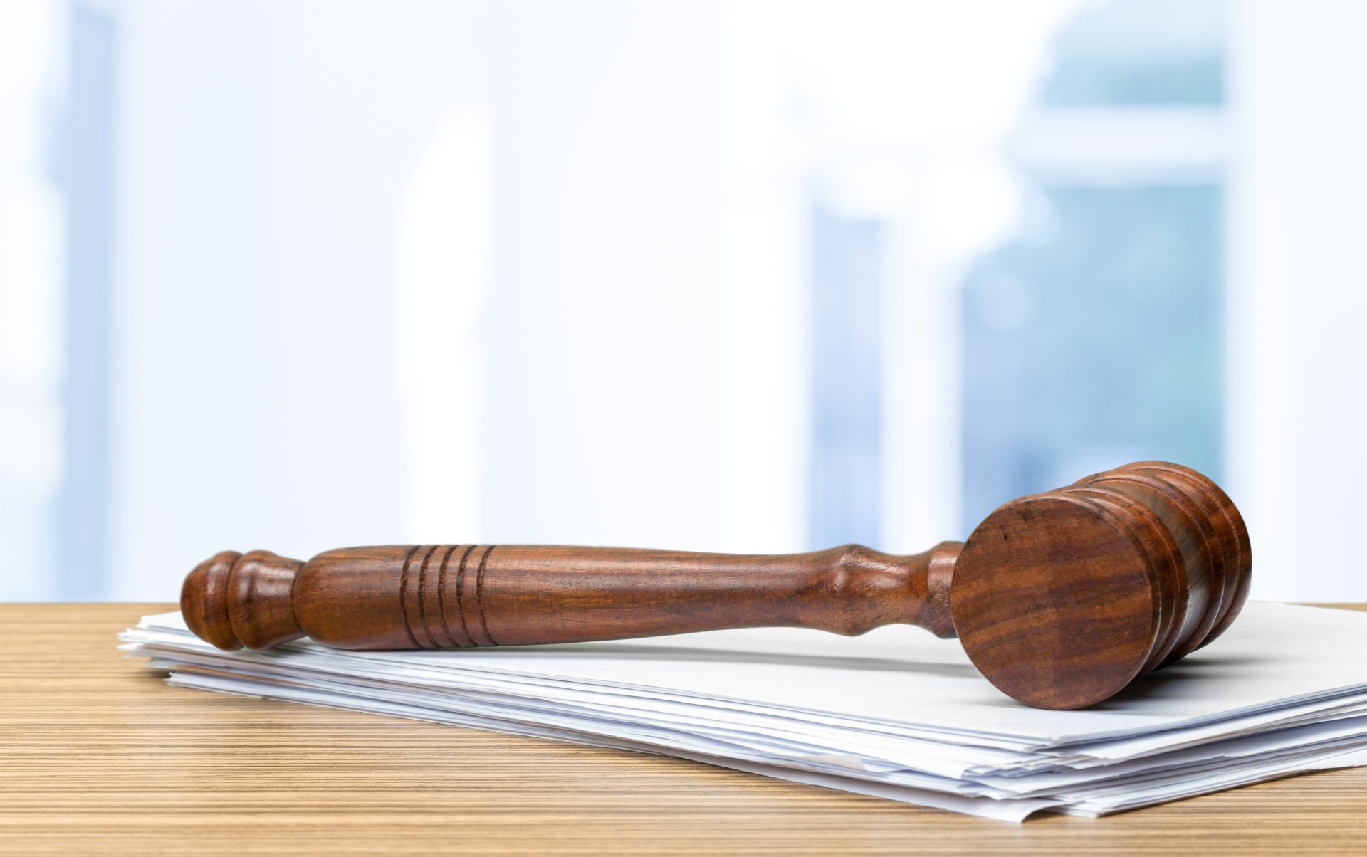judge hammer on white paper and table 2023 11 27 05 13 10 utc