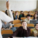 mature teacher working with students inside classr 2023 11 27 05 24 17 utc