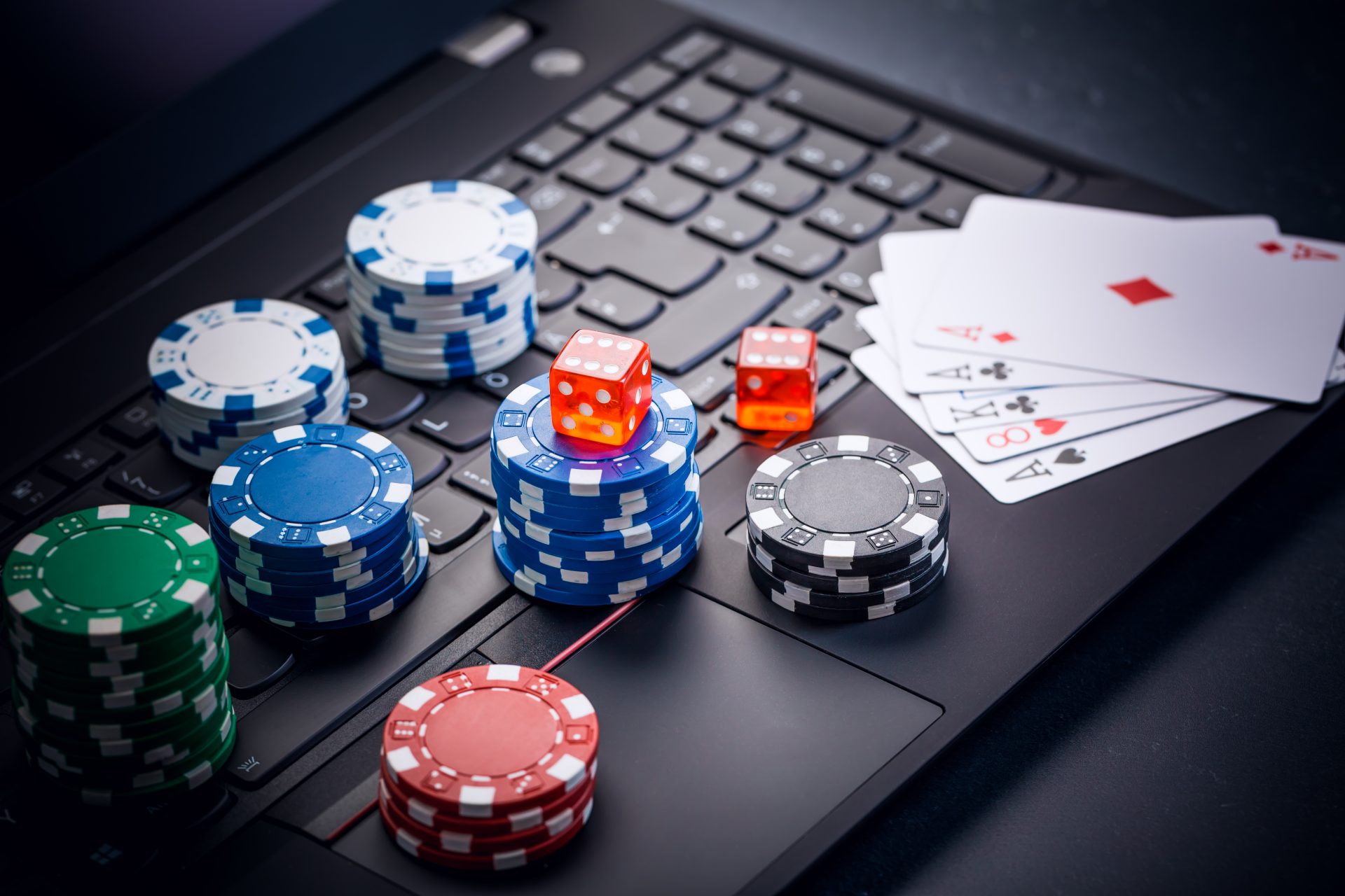 online poker chips cards and dice nearby keyboar 2023 11 27 05 30 16 utc