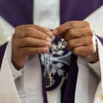 priest pastor and man hands with rosary with cros 2023 11 27 05 25 41 utc