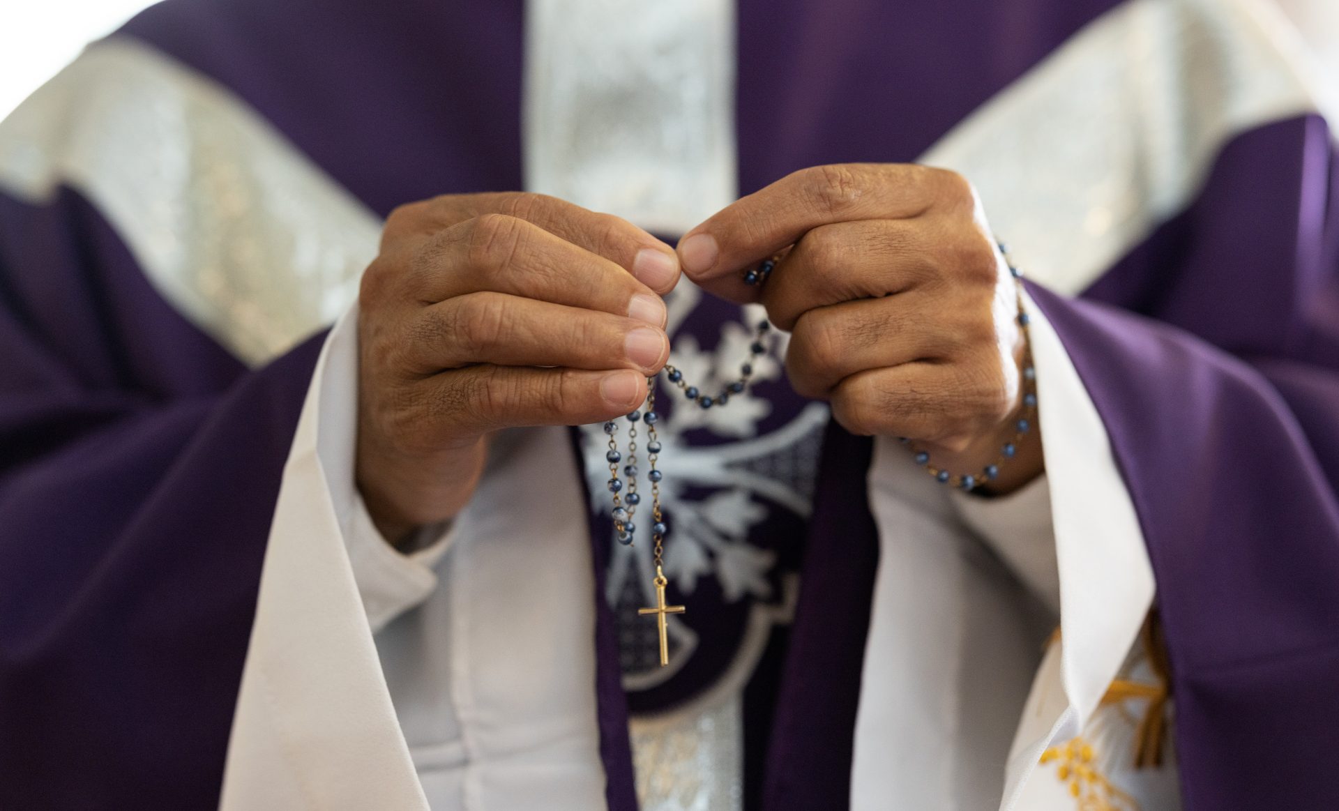 priest pastor and man hands with rosary with cros 2023 11 27 05 25 41 utc