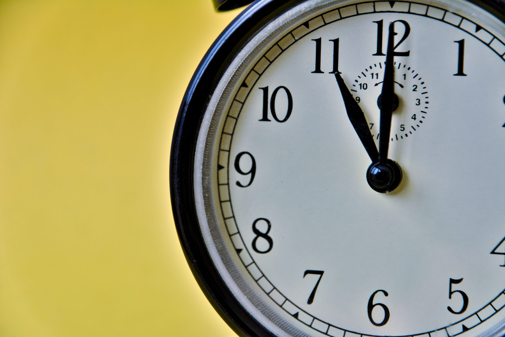 shot of vintage retro analog clock on yellow backg 2023 11 27 05 37 05 utc
