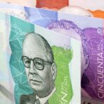 colombian money pesos a background 2023 11 27 05 02 14 utc